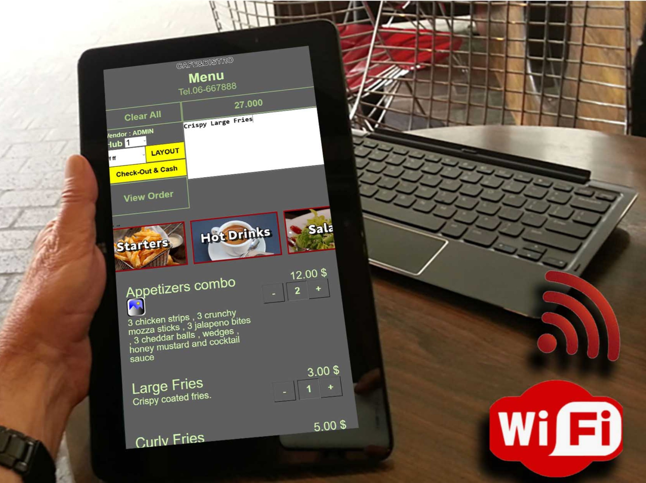 Waiter holding a tablet running the MyShop wireless ordering menu